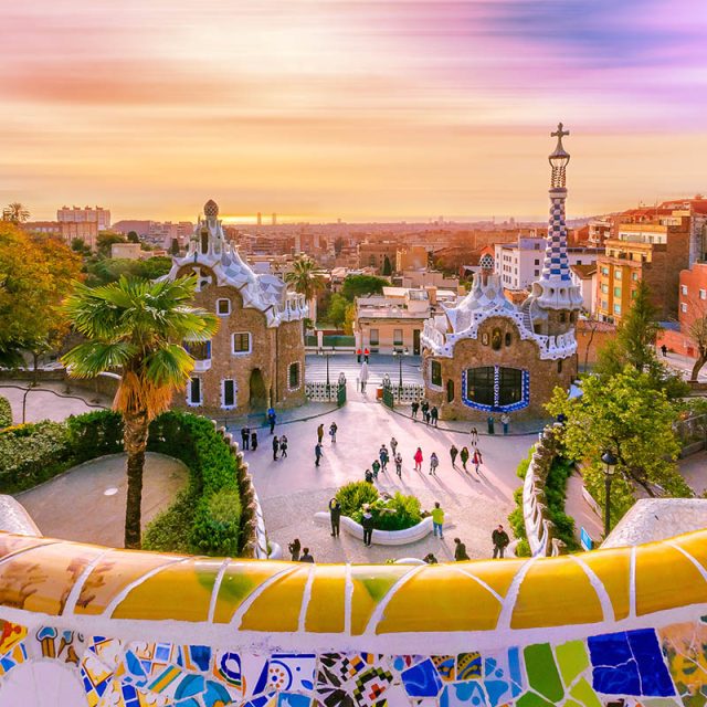 Artistic Mosaics of Europe View of the city from Park Guell in Barcelona, Spain with moving clouds.
